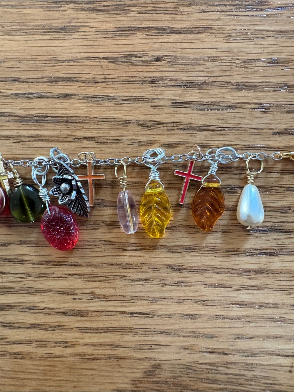 Hand Crafted Multi-Color Glass Charm Bracelet with Cross and Leaf Charms - Picture 7 of 9